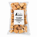 Pumpkin-flavored puffed yak cheese dog treats made with milk, lime juice, salt, and natural pumpkin flavor, packaged in a 1 lb bulk bag.