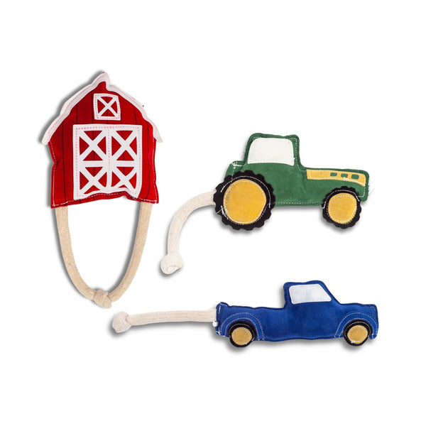 Country Living farm-themed dog toy set with barn, tractor and pickup truck